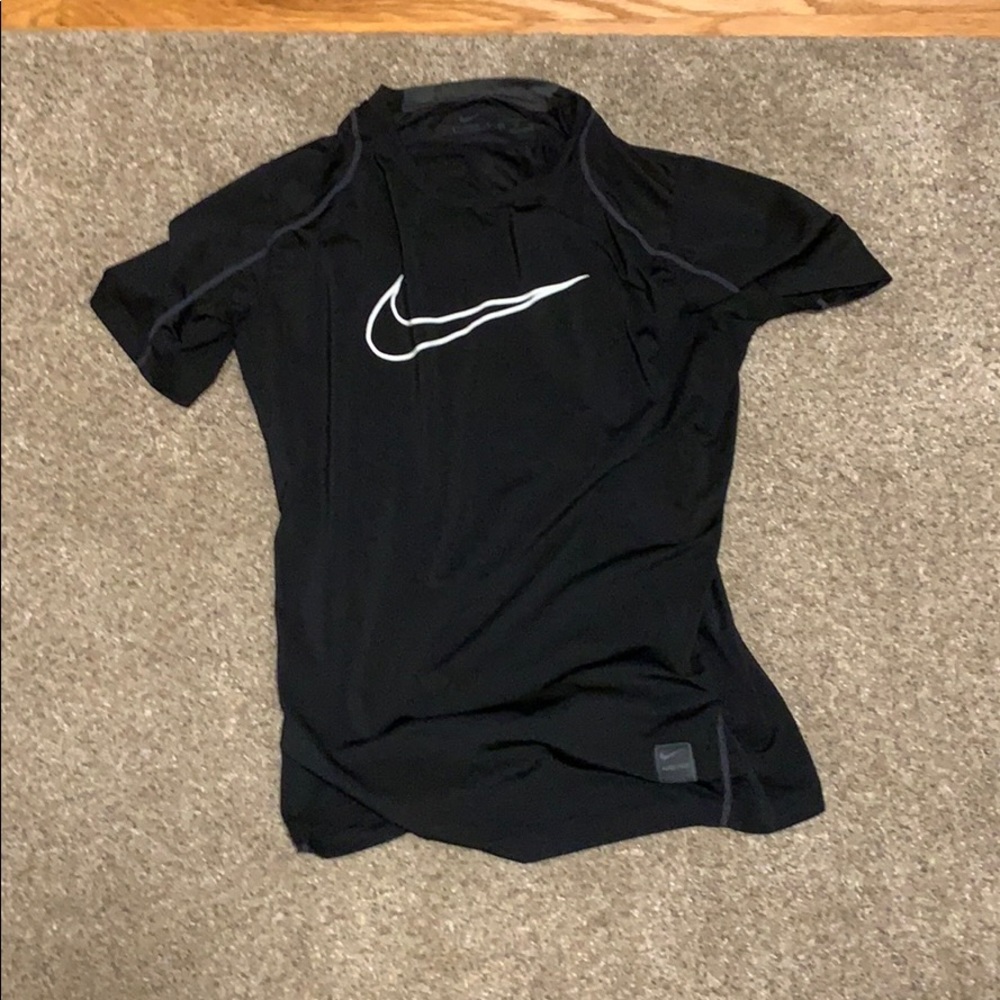 A black nike pro fitted shirt